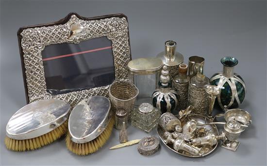 Mixed items including silver photograph frame, pepperettes, spill vases and pair of clothes brushes.